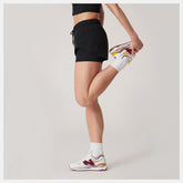Bandier Woven tech Short | New Balance Clothing - Women