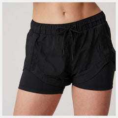 Bandier Woven tech Short | New Balance Clothing - Women