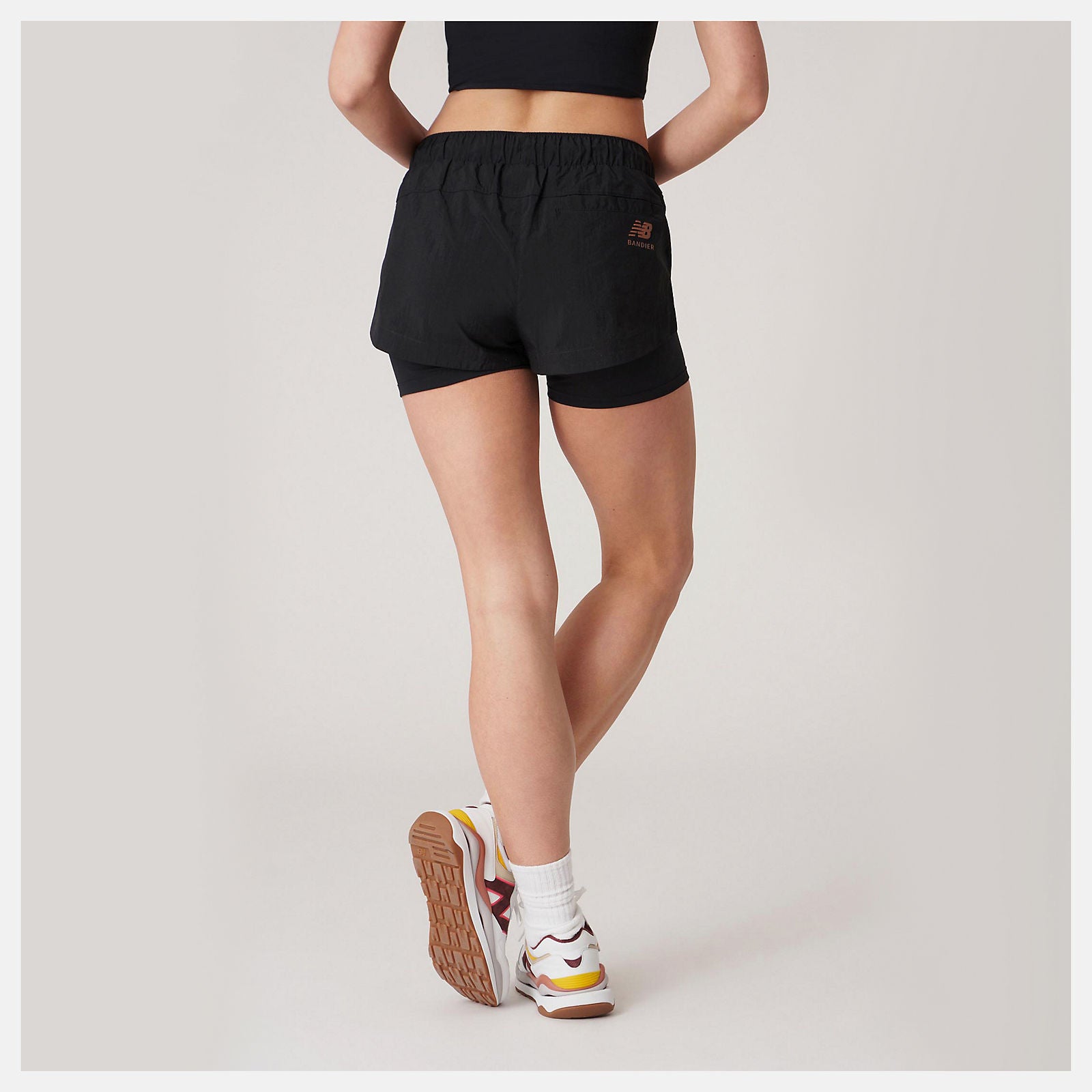 Bandier Woven tech Short | New Balance Clothing - Women