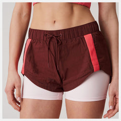 Bandier Woven tech Short | New Balance Clothing - Women